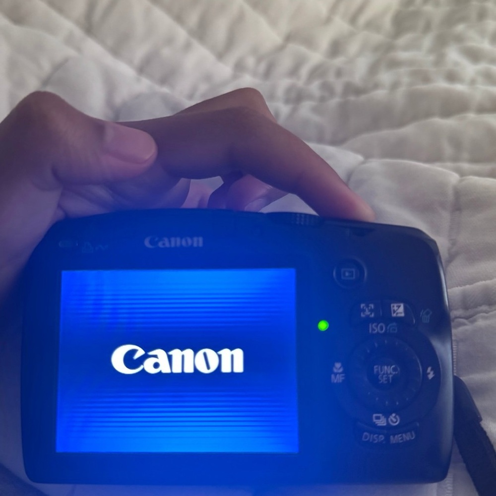 Canon Black Digital Camera with Blue Display